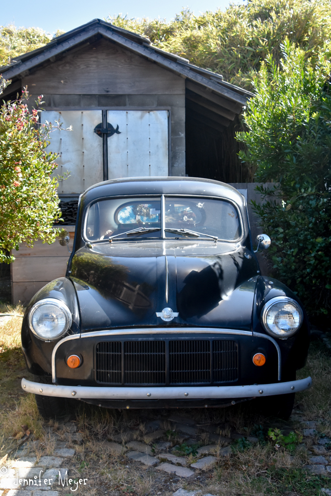 It had this old Morris car parked next to it.