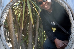 Robin checks out a fence porthole.