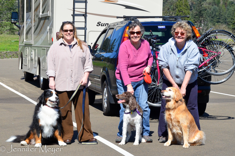 Kelly, Linda, and Kate with dogs Bella, Buddy, and Bailey.