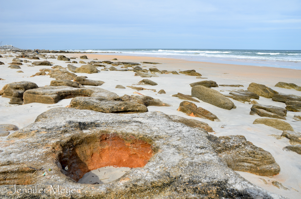 The rocks on the beach have interesting formations.