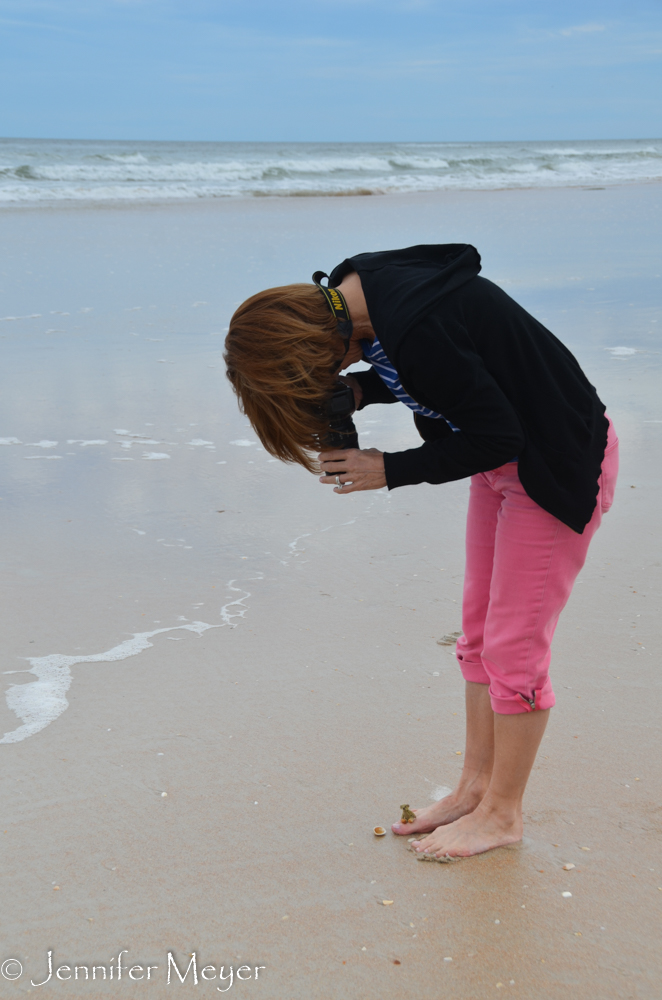 To show how tiny he is, she put him on her foot.