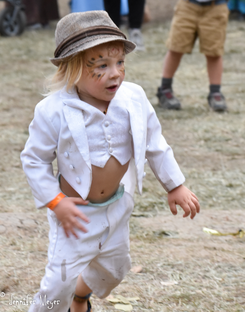 How did this kid's clothes stay relatively white all day?