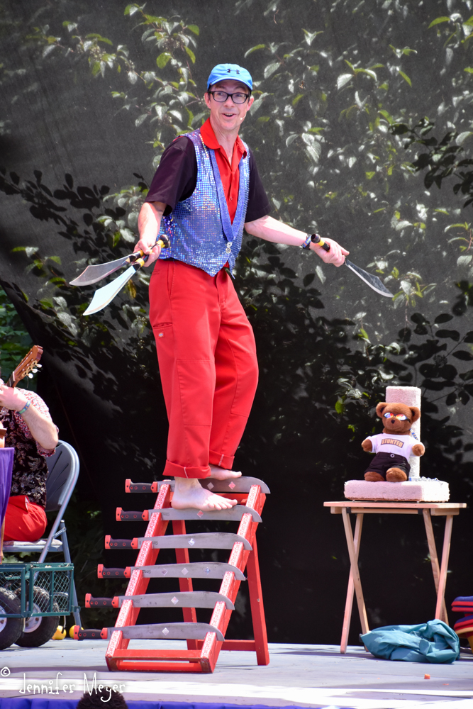 JuggleMania stepped on a machette ladder to juggle machettes.