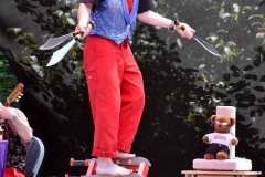 JuggleMania stepped on a machette ladder to juggle machettes.