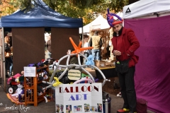 Balloon artist before he smiled at me.