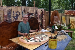 This guy carves fence panels and makes outdoor furniture and art.