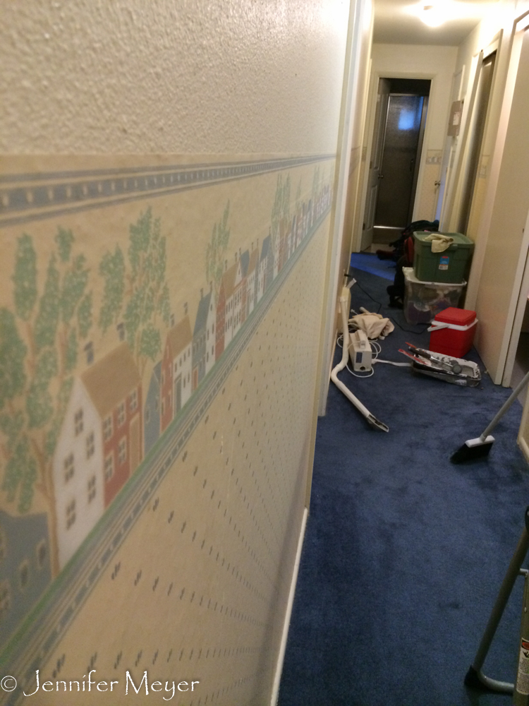 Kate said the wallpaper in the downstairs hallway had to go.