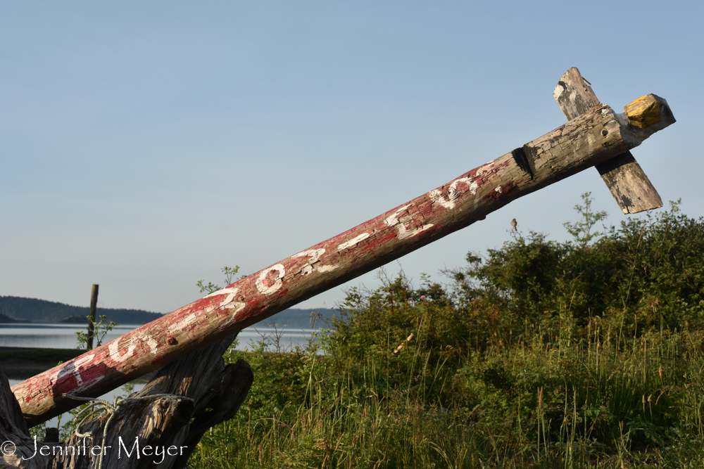Old totem pole on an island.
