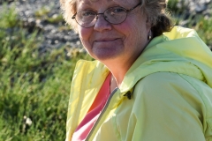 Kate looks for pretty rocks.