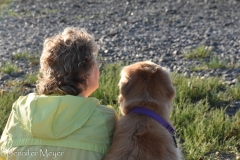 Kate and Bailey gaze out to sea.