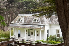 A Victorian house on a cliff.