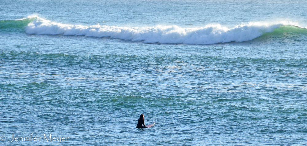 And this woman catch some waves.