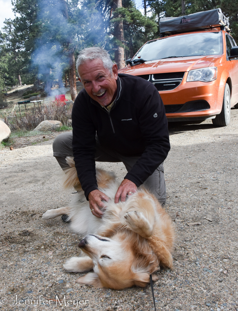 A campground neighbor gives Bailey a nice rubdown.