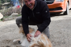 A campground neighbor gives Bailey a nice rubdown.