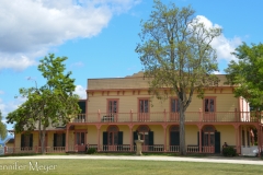 The Plaza Hall, across the green from the mission.