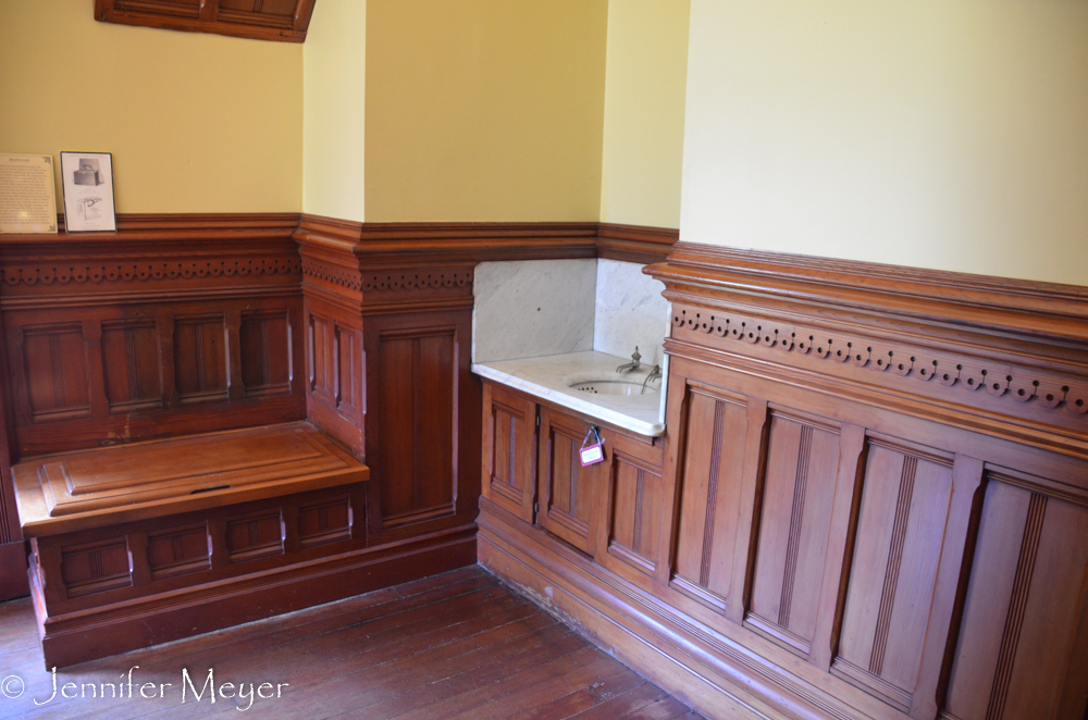 Early flush commode on the left.