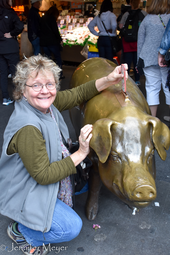 Kate thinks to penny slot looks like a phone charger.