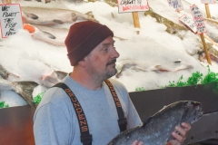 I didn't catch any fish-tossing photos but this guy offered to pose with one.