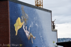 Swinging from a chandelier.