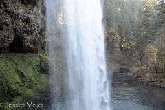 From behind the falls.