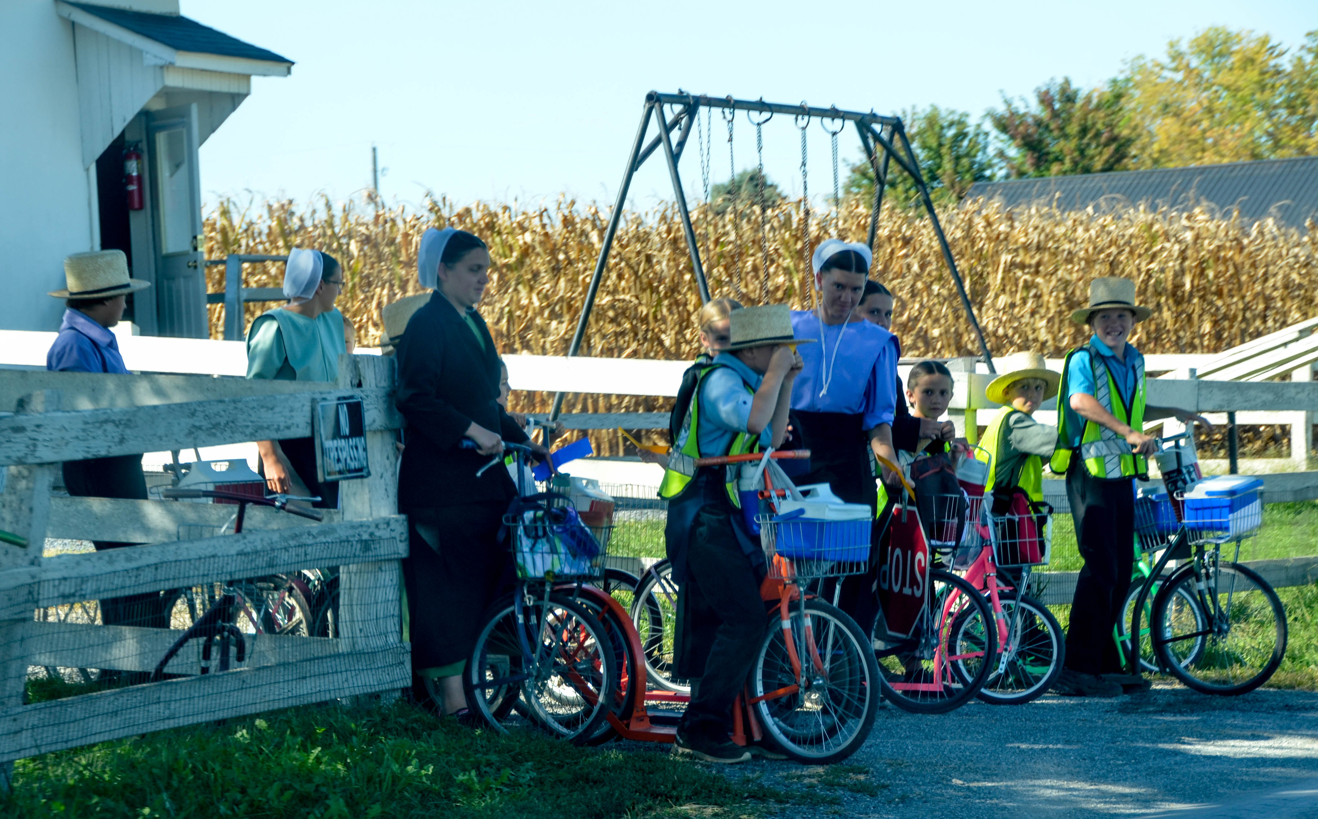 Teachers help kids ease safely into traffic.