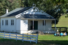 And the one-room schoolhouse: boys have lunch in front, girls were in back.