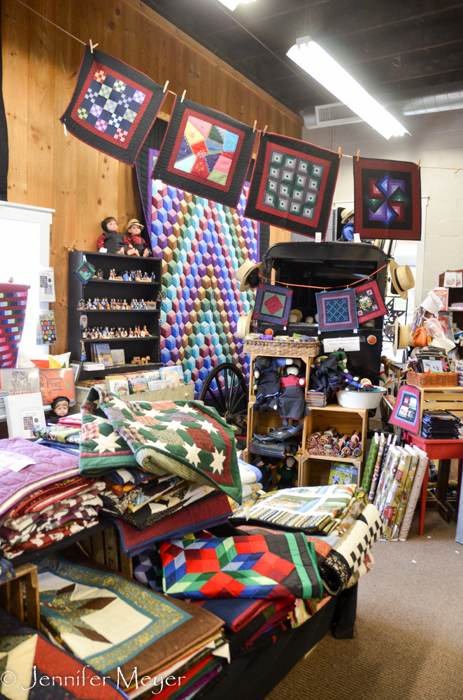 Lots of quilts and supplies for sale.