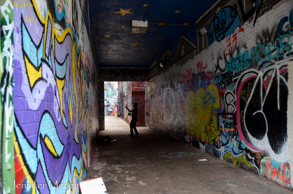 This guy was dancing away in this alley.