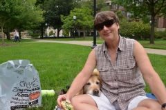 Bailey patiently waits for a bread crust.