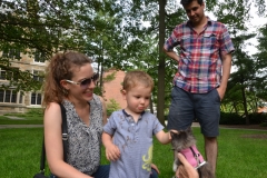 Young and old are drawn to her.