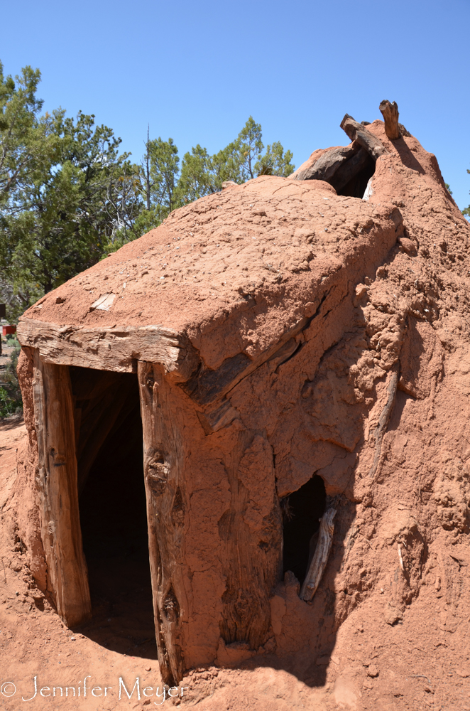At the Navajo Monument, a replica of a primitive mud house.