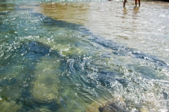 Underwater rock slabs.