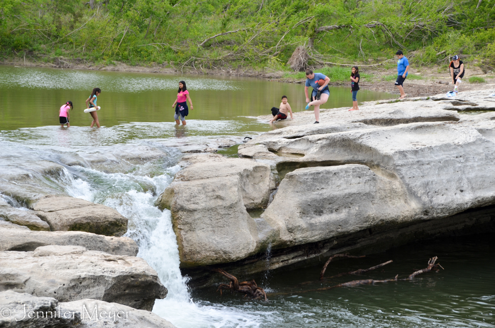 You have to wade across slippery rocks to get to the beach.