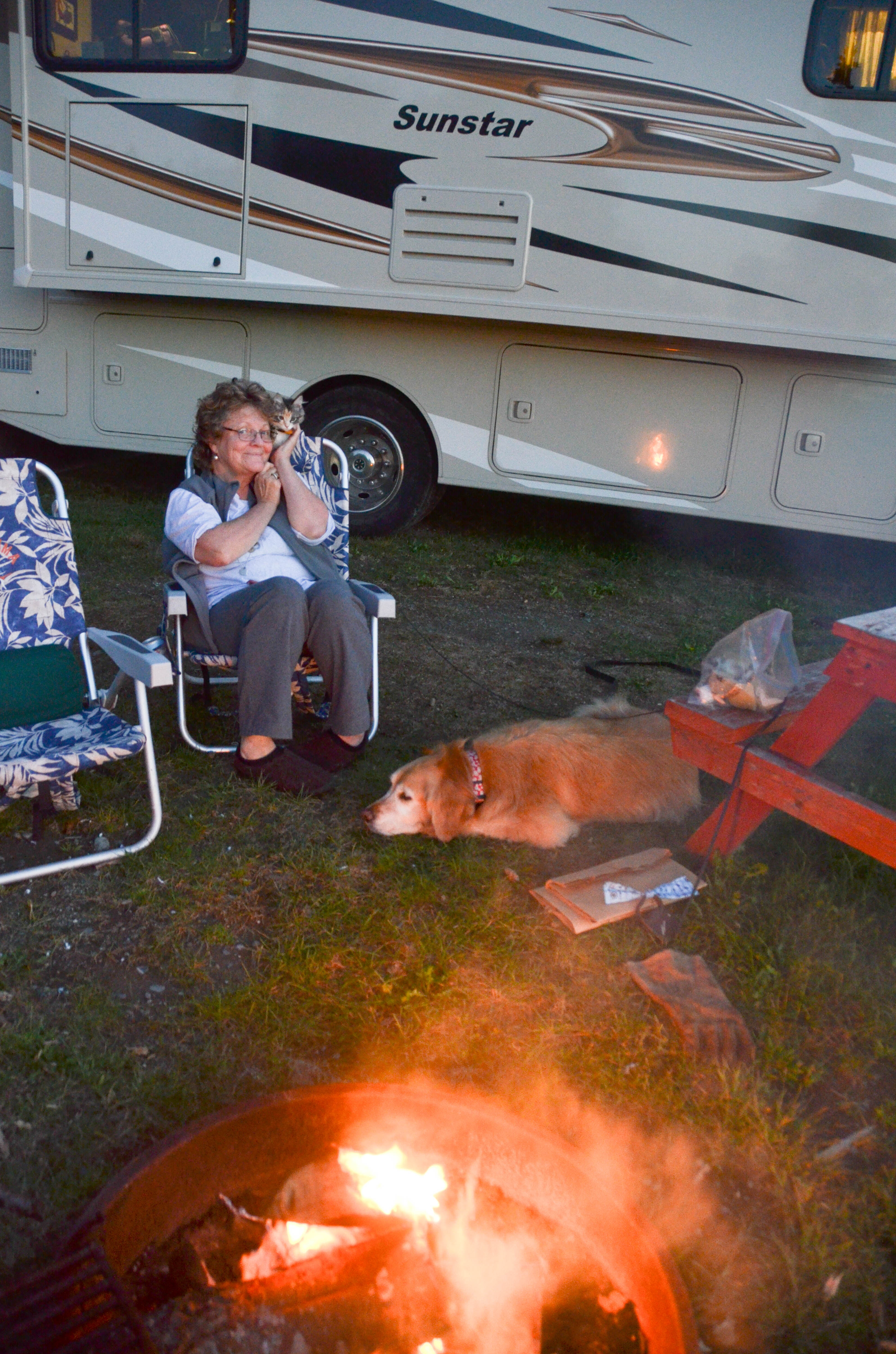 Enjoying the sunset and fire.