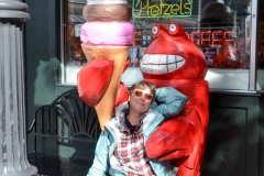 I pose with a lobster.