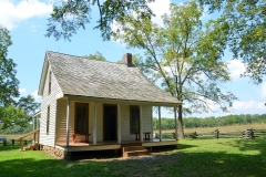 Later, the Carvers replaced the log home (damaged by tornado) with this one.