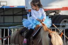 Pony ride in a tutu.