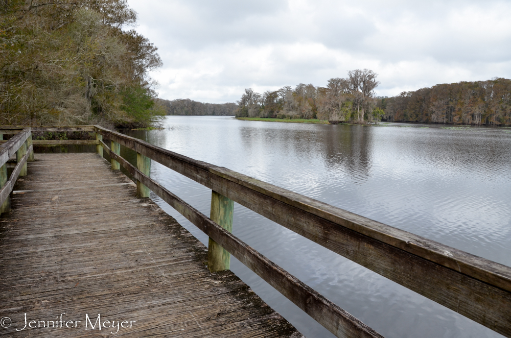 A long walkway on the lake.