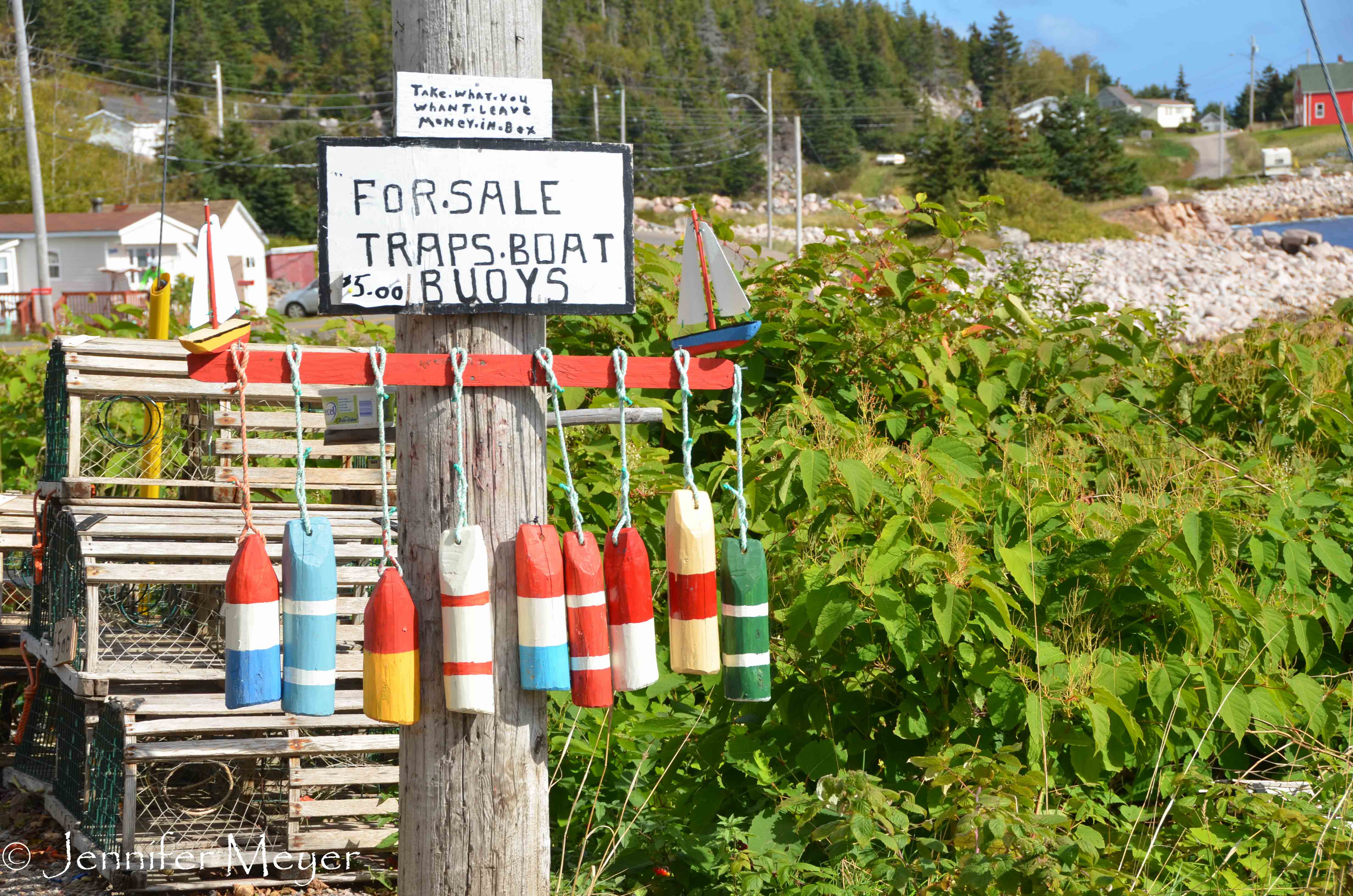 Buoys and boats for sale.