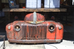 Full of repurposed junk, such as a truck table.