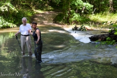 We stepped slowly across it together.