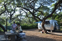 Beth and Don braved the skeeters to cook dinner.