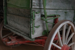 Old wagons in a barn.