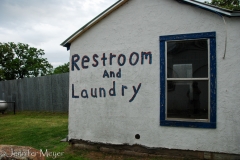 Actually, all it had was a toilet behind a curtain.