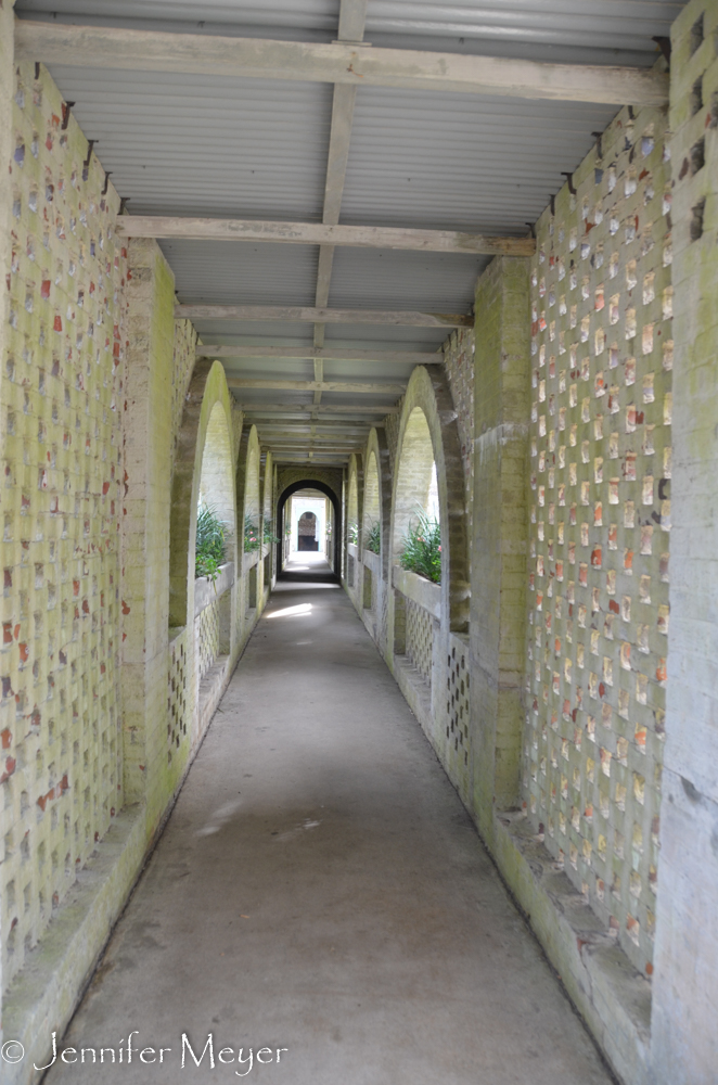 The entrance is a long covered walkway.