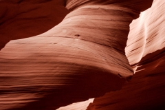 woman in the wind, one of many shapes seemingly carved into the rocks.