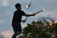And he juggles fire!