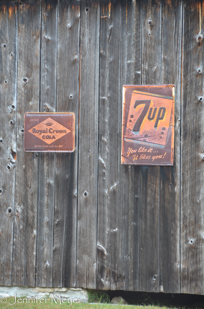 Signs on a barn.