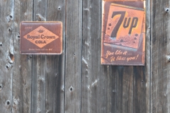 Signs on a barn.