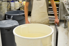 A worker shows us the sourdough starter.